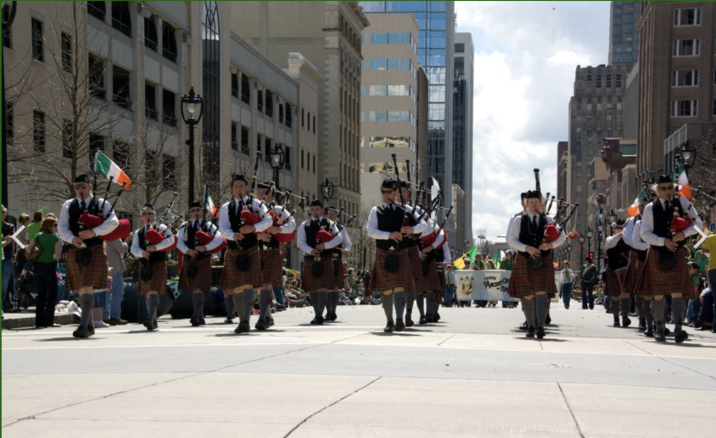 Bagpipe players downtown parade