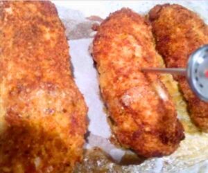 Fried Chicken breast with thermometer inserted