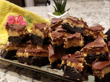Brownies on a tray with decorative towel